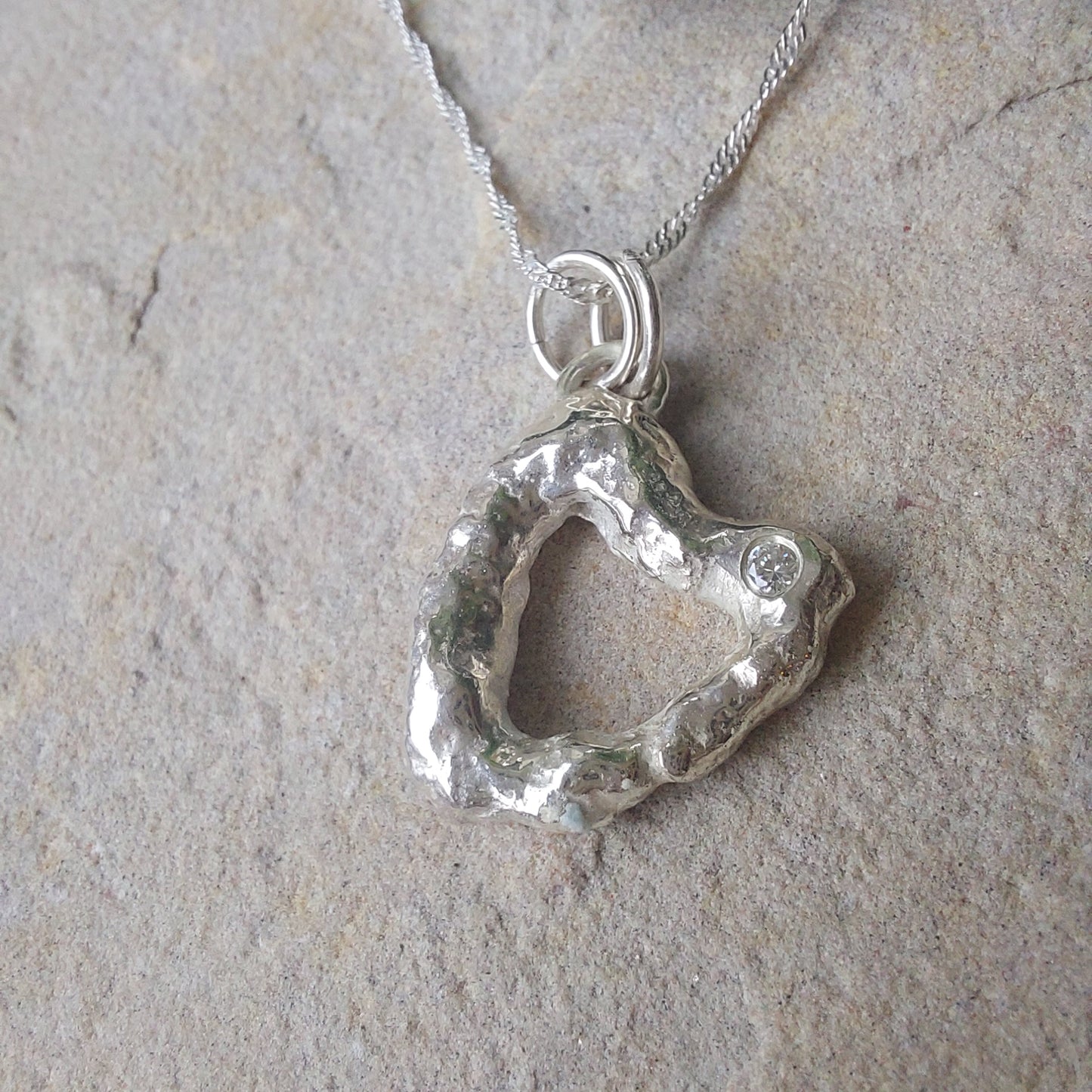 'Melt My Heart' - Molten Sterling Silver Heart Pendant with a Clear CZ Sparkle