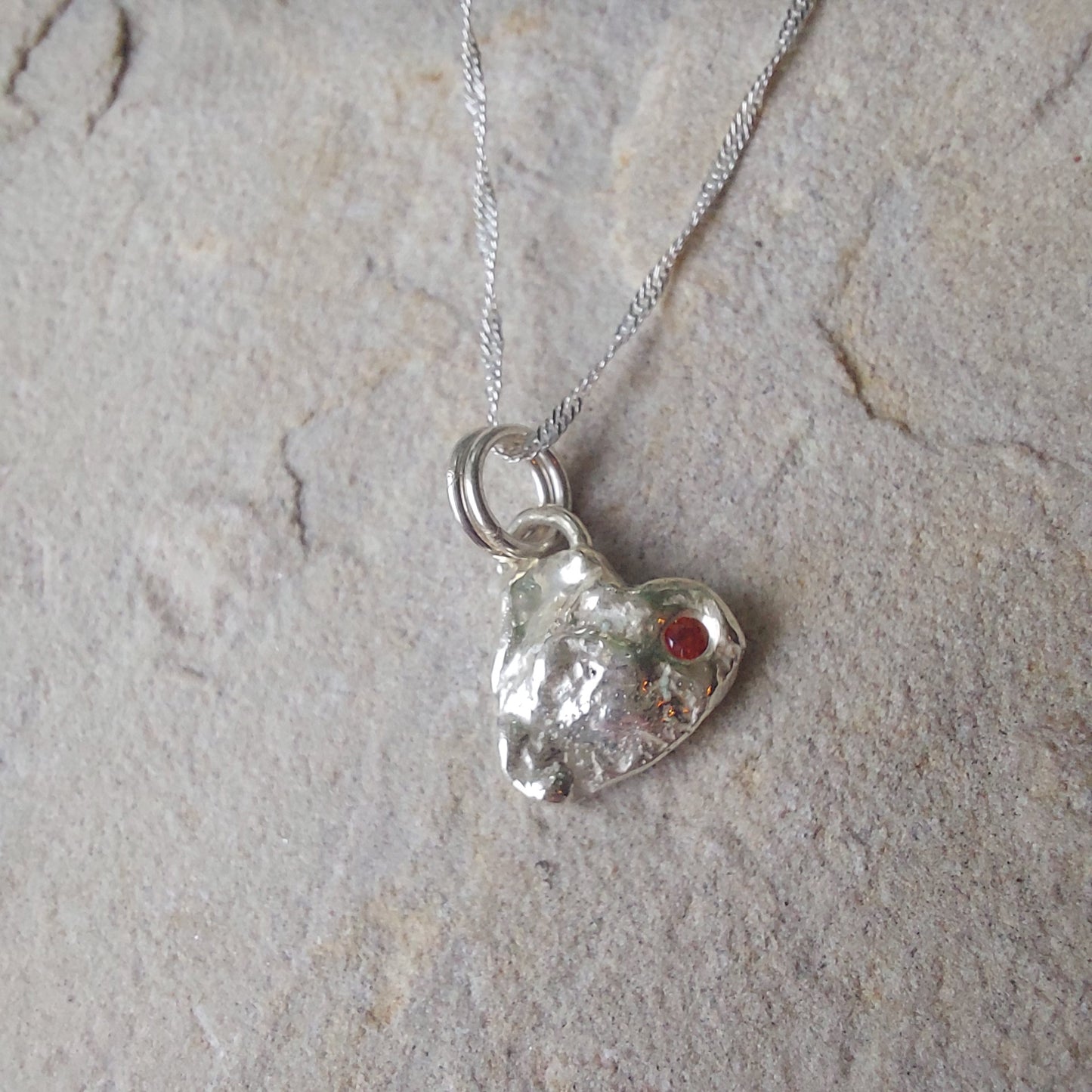 'Melt My Heart' - Molten Sterling Silver Little Heart Pendant with a Red CZ Sparkle