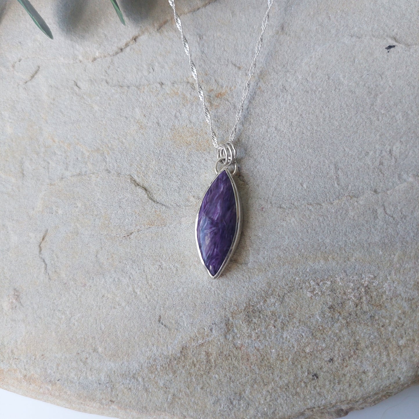 Unusual Purple Charoite Crystal and Sterling Silver Marquise Shaped Pendant.