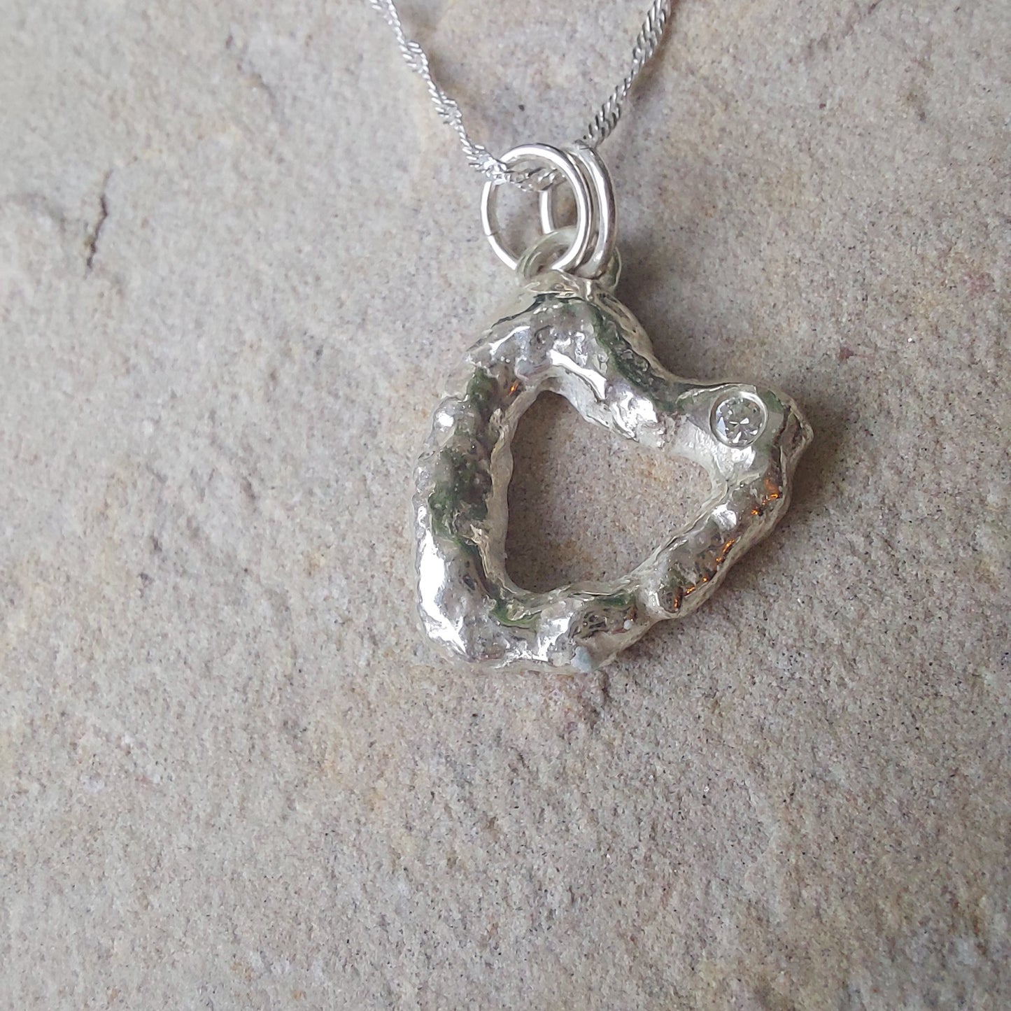'Melt My Heart' - Molten Sterling Silver Heart Pendant with a Clear CZ Sparkle
