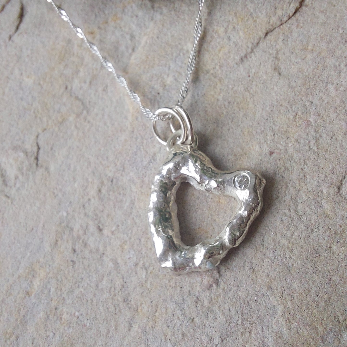 'Melt My Heart' - Molten Sterling Silver Heart Pendant with a Clear CZ Sparkle
