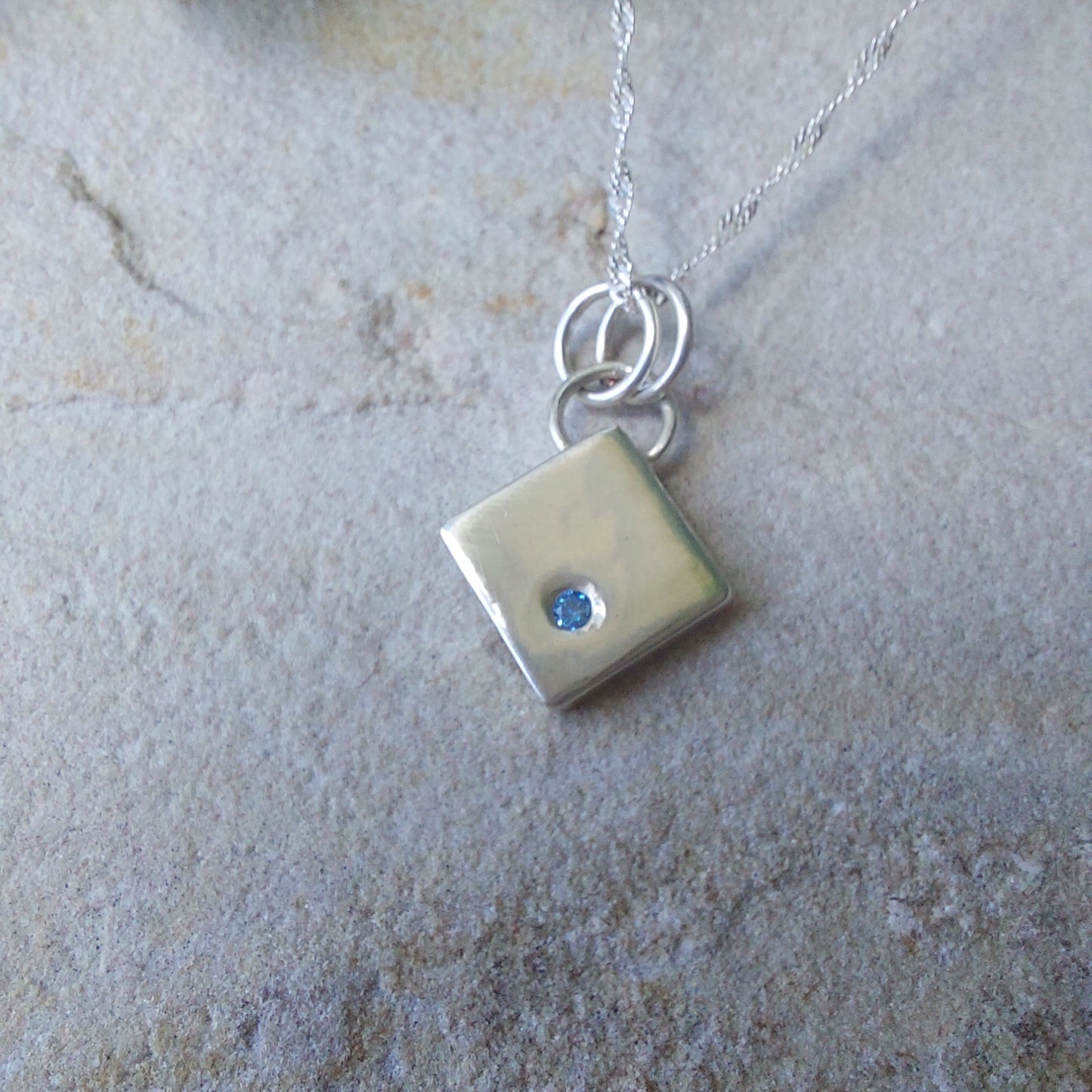 Contemporary Blue CZ and Silver Diamond Shaped Pendant