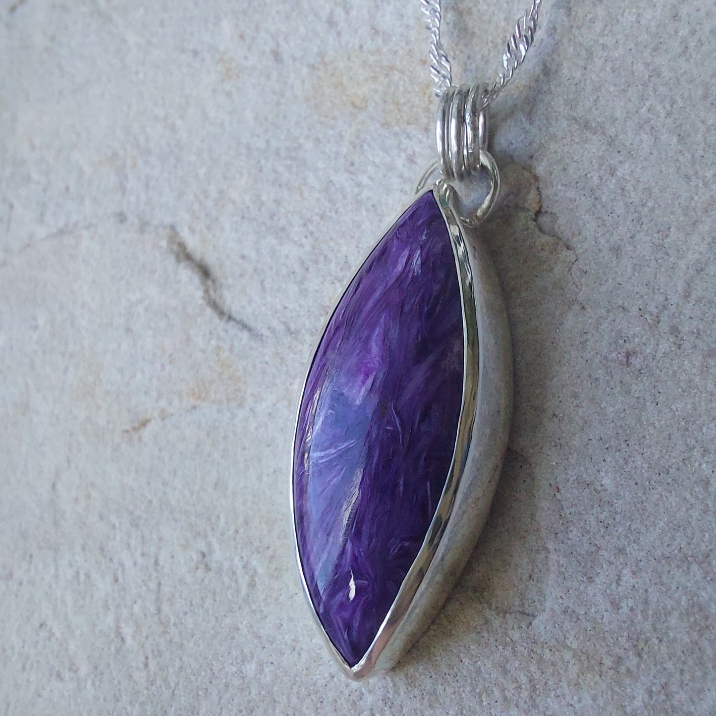 Unusual Purple Charoite Crystal and Sterling Silver Marquise Shaped Pendant.