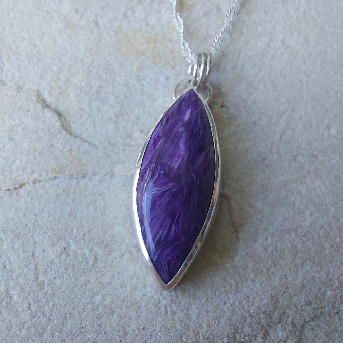 Unusual Purple Charoite Crystal and Sterling Silver Marquise Shaped Pendant.